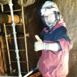 American Efficiency working on HVAC equipment